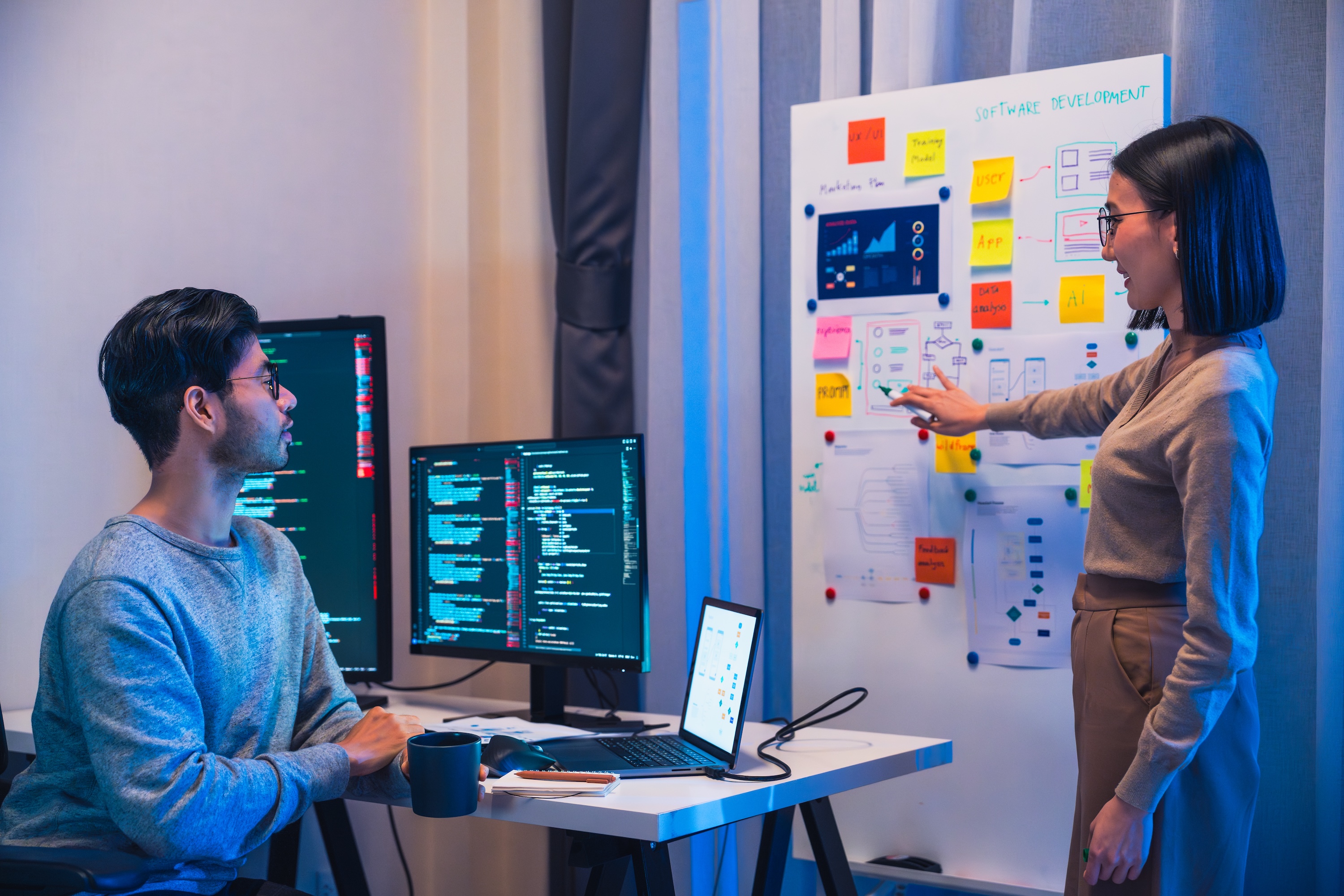 Developer and team designer present project interface design