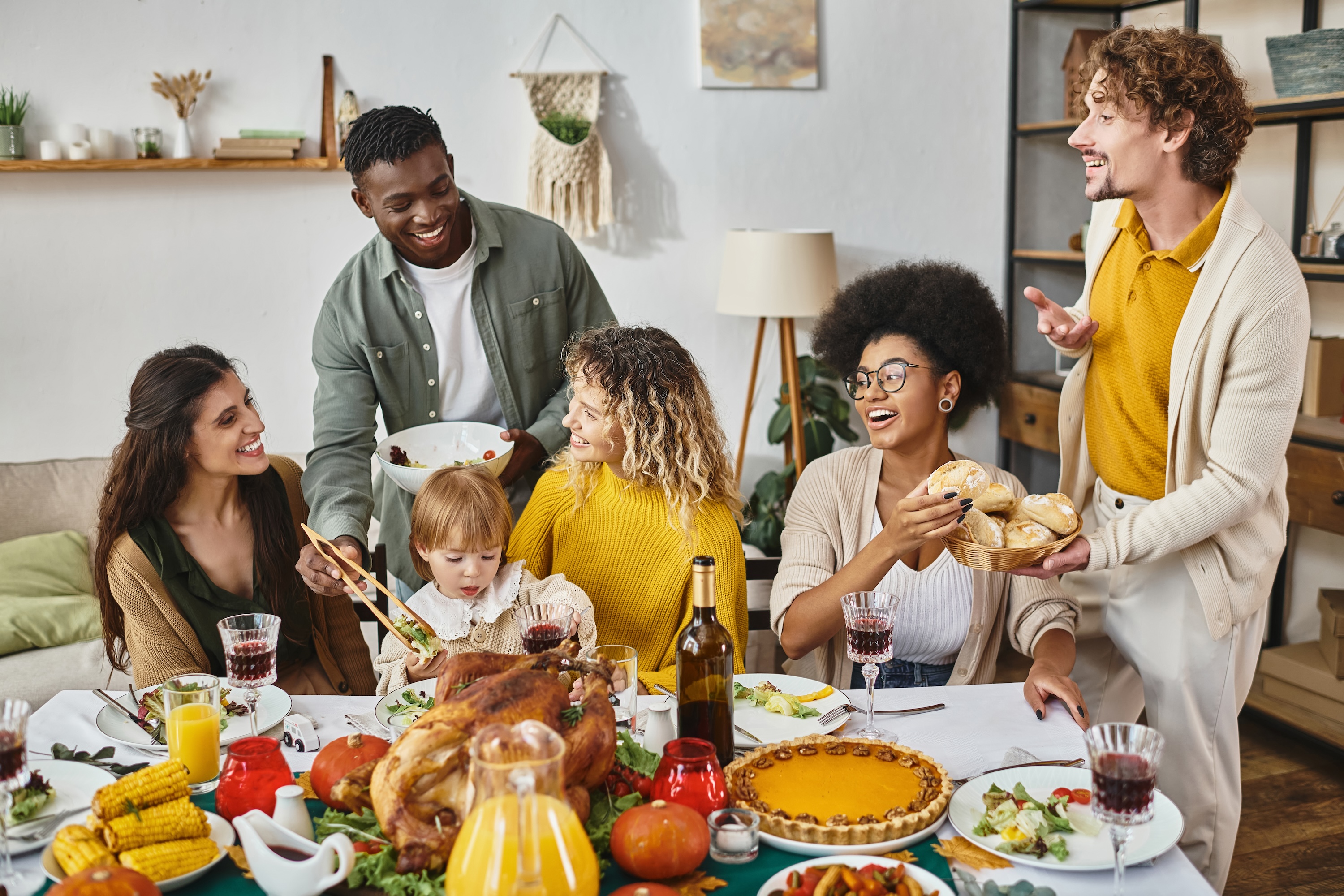 Thanksgiving with friends and family around a feast