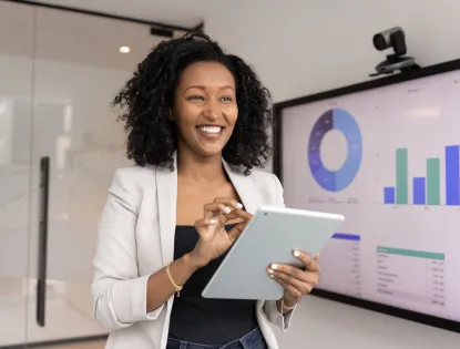 Successfully smiling your business woman using digital tablet