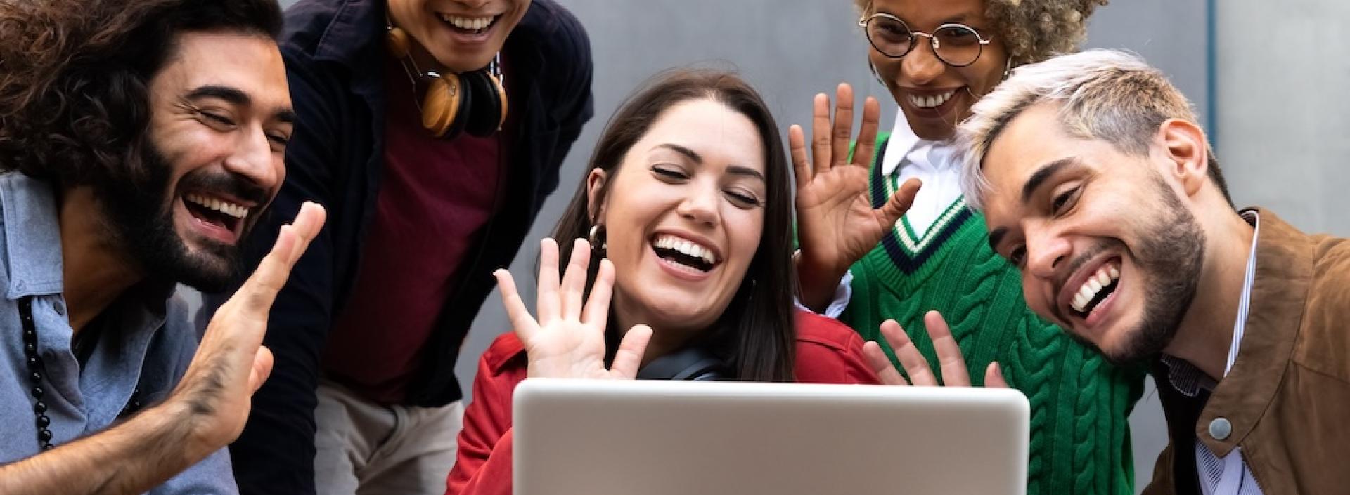 Group of friends smiling and creating an online presence on a call