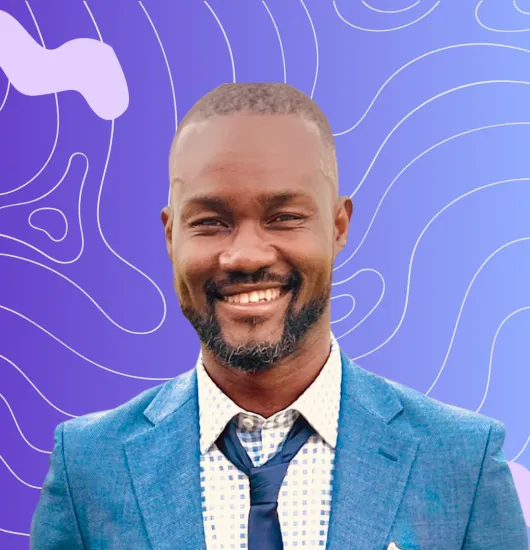 headshot of founder ralph francois on a blue background